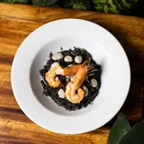 Creamy black rice with shrimp