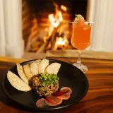 Mushroom tartare with crisps and radishes, by the fireplace